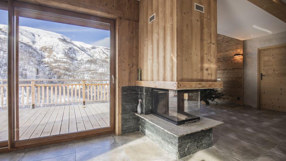 Holiday in mountain resort Chalet Matangie - Les Menuires - Fireplace