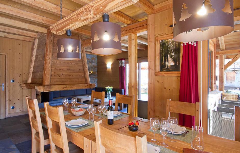 Holiday in mountain resort Chalet Prestige Lodge - Les 2 Alpes - Dining area