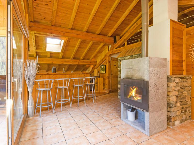 Holiday in mountain resort Chalet Ulysse - Peisey-Vallandry - Fireplace