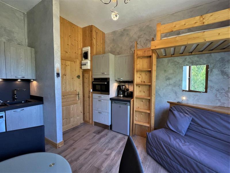 Urlaub in den Bergen 2-Zimmer-Appartment für 4 Personen (1320) - La Résidence Caron - Les Menuires - Wohnzimmer