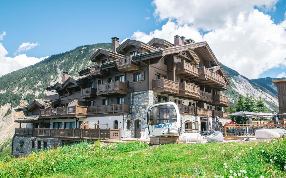 Vacances en montagne Manali Lodge - Courchevel - Extérieur été