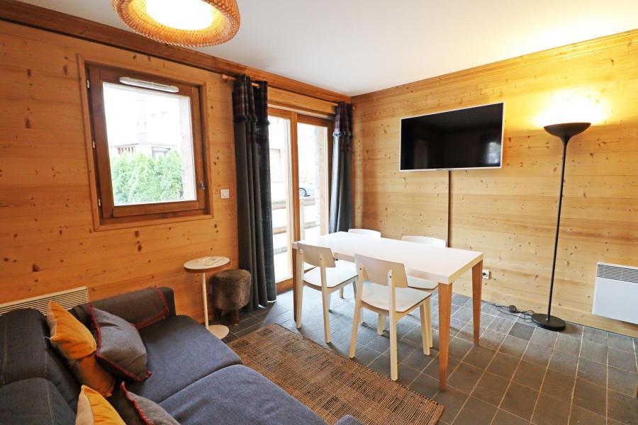 Holiday in mountain resort 2 room apartment sleeping corner 4 people - Résidence Chalune - Les Gets - Living room