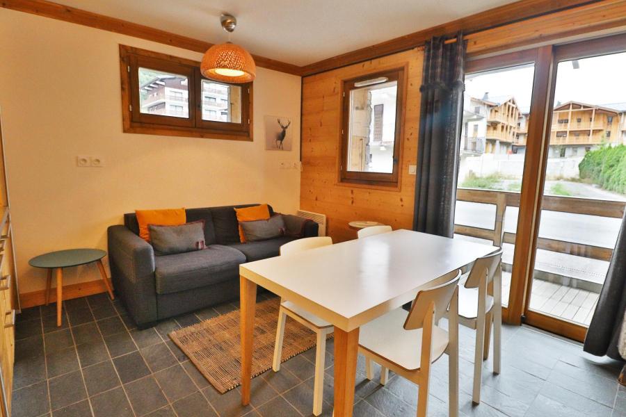 Holiday in mountain resort 2 room apartment sleeping corner 4 people - Résidence Chalune - Les Gets - Living room