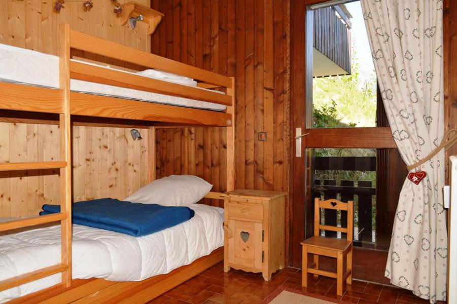 Vacaciones en montaña Apartamento 3 piezas para 6 personas (E) - Résidence le Caribou - Le Grand Bornand - Camas literas