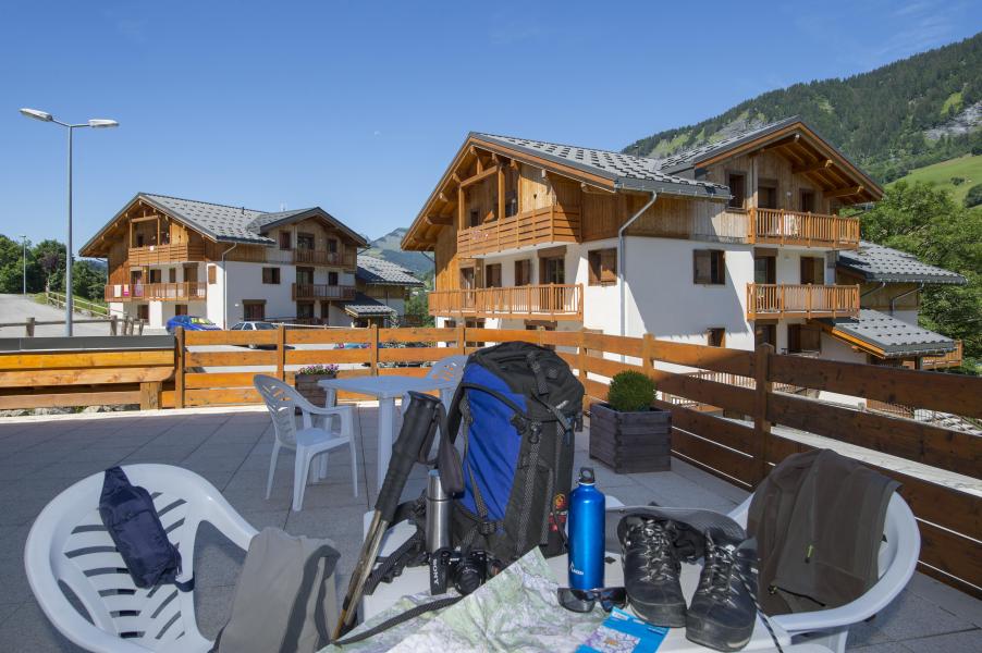 Ski verhuur Résidence les Chalets des Evettes - Flumet - Buiten zomer