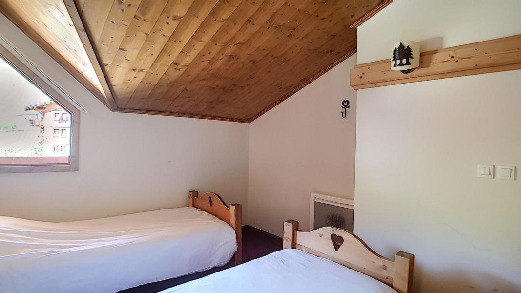 Urlaub in den Bergen 5 Zimmer Maisonettewohnung für 10 Personen (9) - Résidence les Cristaux - Les Menuires - Schlafzimmer