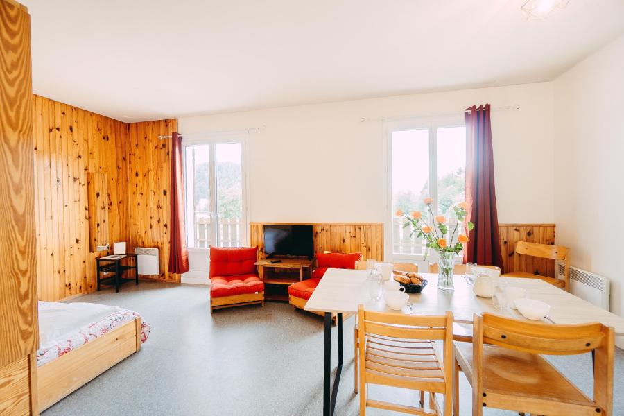 Vakantie in de bergen Studio 6 personen - Résidence les Myrtilles - Gérardmer - Woonkamer