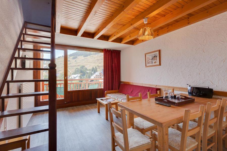 Holiday in mountain resort 3 room duplex apartment sleeping corner 8 people - Résidence Meijotel - Les 2 Alpes - Table