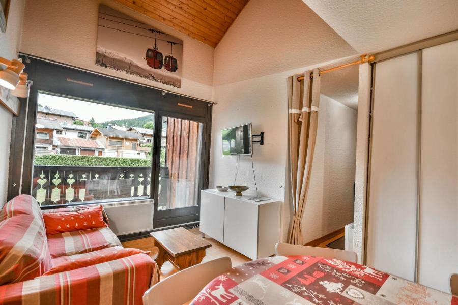 Holiday in mountain resort 2 room duplex apartment sleeping corner 4-6 people (2146) - Résidence Praz du Soleil - Les Gets - Living room