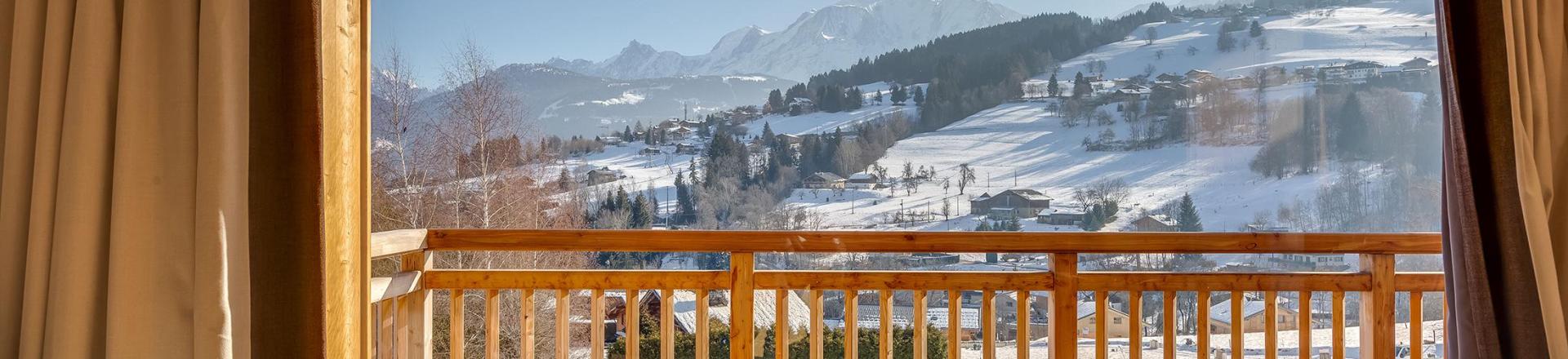 Urlaub in den Bergen Doppelchalethälfte 5 Zimmer für 10 Personen (triplex) - Résidence les Fermes du Mont Blanc - Combloux - Balkon