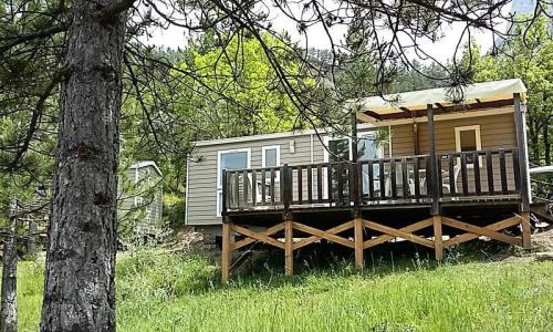 Wakacje w górach Mobil-home 3 pokojowy dla 4 osób (Confort 26m²) - Camping Flower le Clot du Jay - Clamensane - Na zewnątrz latem