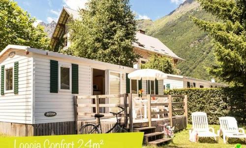 Wakacje w górach Mobil-home 3 pokojowy dla 4 osób (Confort 24m²) - Camping Le Château de Rochetaillée - Le Bourg-d'Oisans - Na zewnątrz latem