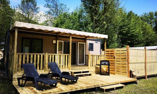 Urlaub in den Bergen 3-Zimmer-Mobilheim für 4 Personen (30m²) - Camping Le Colporteur - Le Bourg-d'Oisans - Draußen im Sommer