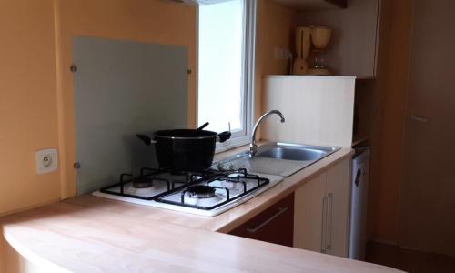 Vacances en montagne Mobil-Home 3 pièces 2 personnes (28m²) - Camping Les Jardins d'Estavar - Estavar - Extérieur été