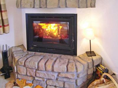 Holiday in mountain resort Chalet Charmille - La Tzoumaz - Fireplace