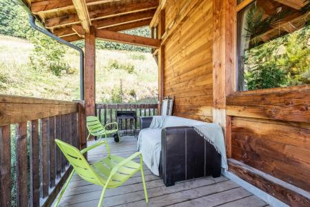 Holiday in mountain resort 5 room semi-detached chalet cabin 10 people - Chalet Johmarons - Les Gets - Summer outside