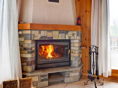 Holiday in mountain resort Chalet Krokus - Thyon - Fireplace