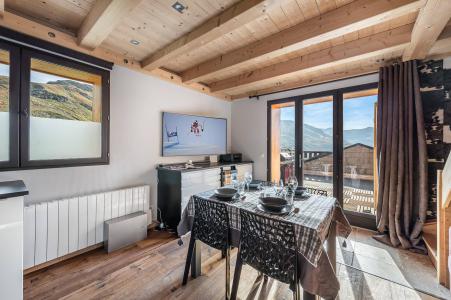 Holiday in mountain resort 3 room duplex apartment 4 people (ROCHER DE THORENS) - Chalet le Rocher - Val Thorens - Table