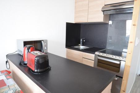 Vacances en montagne Studio 3 personnes (910) - La Résidence Caron - Les Menuires - Kitchenette