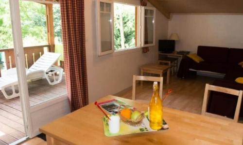 Vakantie in de bergen Chalet 3 kamers 4 personen (Confort 29m²) - Le Malazéou Wellnesse Sport Camping - Ax-les-Thermes - Buiten zomer