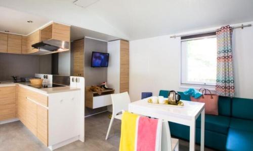 Wakacje w górach Mobil-home 4 pokojowy dla 6 osób (42m²) - Le Malazéou Wellnesse Sport Camping - Ax-les-Thermes - Na zewnątrz latem