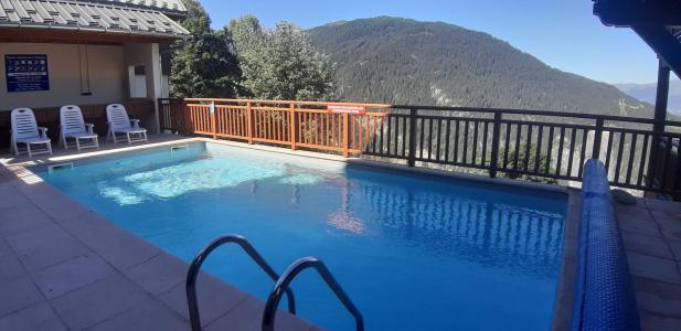 Holiday in mountain resort Les Chalets des Deux Domaines - Peisey-Vallandry - Swimming pool