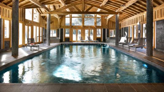 Vacances en montagne Résidence Boutique Le Hameau de Pierre Blanche - Les Houches - Piscine