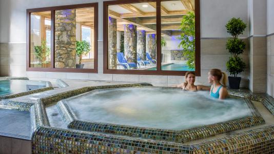 Vacaciones en montaña Résidence Boutique Les Chalets de Layssia - Samoëns - Jacuzzi