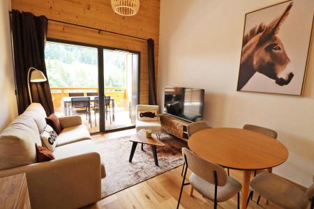 Holiday in mountain resort 2 room apartment sleeping corner 4 people - Résidence Cairn Harmony  - Les Gets - Living room