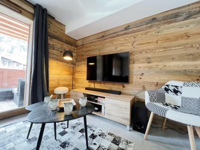 Holiday in mountain resort 2 room apartment cabin 6 people - Résidence Carmine Lodge - Les Gets - Living room