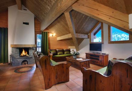 Holiday in mountain resort Résidence Chalet des Neiges - Oz en Oisans - Fireplace