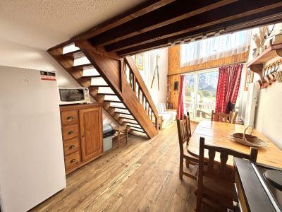 Urlaub in den Bergen Wohnung 3 Mezzanine Zimmer 8 Leute (1009) - Résidence la Grande Masse - Les Menuires - Wohnzimmer