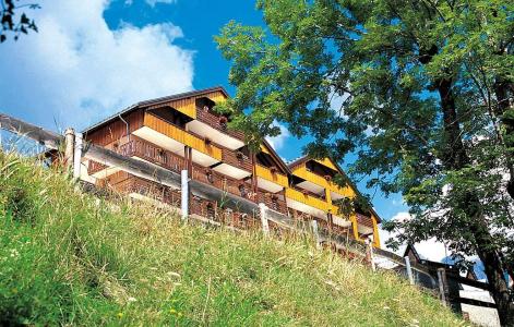 Location au ski Résidence le Dôme des Rousses - Vaujany - Extérieur été