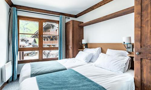 Ski verhuur Appartement 3 kamers 6 personen (Prestige 57m²) - Résidence Les Arcs 1950 le Village - Maeva Home - Les Arcs - Buiten zomer