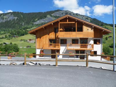 Location au ski Résidence les Chalets des Evettes - Flumet - Extérieur été