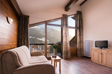 Urlaub in den Bergen Résidence les Chalets du Mont Blanc - Les Saisies - Fenstertür zum Balkon