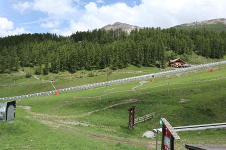 Holiday in mountain resort Logement 2 pièces 7 personnes (907) - Résidence Parc des Airelles - Les Orres - Summer outside