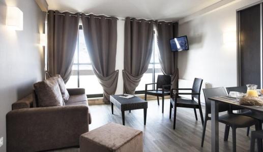 Vakantie in de bergen Résidence Pierre Blanche - Les Menuires - Woonkamer